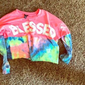 A half tie-dye half pink crop top from Rue 21